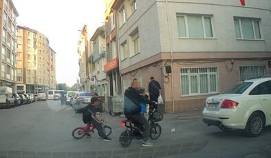 Bisikletli çocuk aracın altında kalmaktan son anda kurtuldu