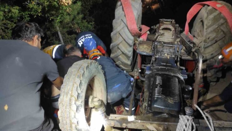 Devrilen traktörün altında kalan sürücü kurtarıldı